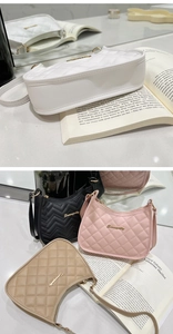 Close-up of quilted faux leather shoulder bags in white, black, pink, and khaki with gold logo