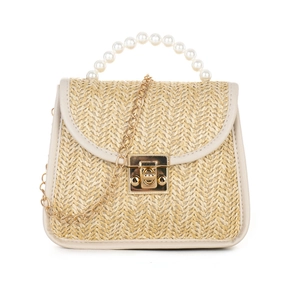 Mini straw woven handbag with pearl handle and gold chain strap on white background
