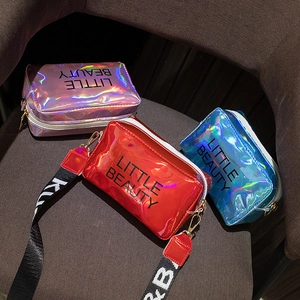 Three colorful laser holographic square bags with Little Beauty print and woven straps