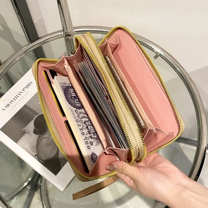 Pink heart-stitched long wallet for women with dual zippers and large storage capacity