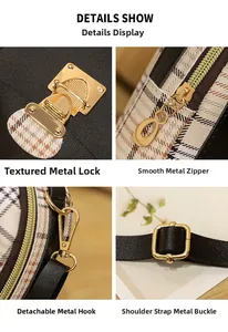 Close-up of golden rotating lock and metal zipper on black and brown plaid backpack