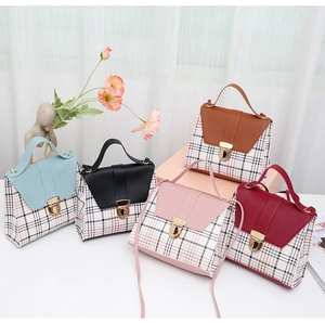 Five elegant printed crossbody bags in blue, black, brown, pink, and burgundy colors