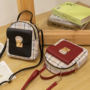 Mini plaid backpack for women featuring leather pocket, gold buckles and adjustable straps