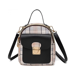 Mini plaid backpack for women with brown pattern and black leather flap detailing
