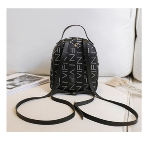 Detail of black backpack with VIFN letter print on lychee pattern PU leather