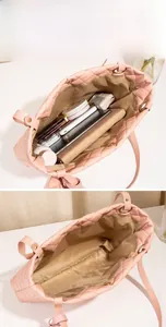Pink quilted tote bag interior view showing large storage capacity for daily items