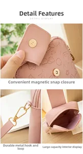 Pink crossbody bag detail showing metal magnetic closure and durable hardware hooks