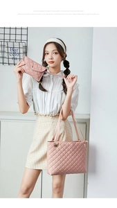 Close-up of pink quilted leather tote bag and pouch set on a fashion model