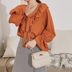 Fashionable dark orange chiffon shirt with ruffle neck and lantern sleeves for women