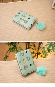 Mint green zipper wallet with geometric logo print and cute fluffy pom-pom keychain