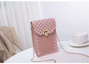 Detailed view of pink floral mini crossbody bag with gold chain and metal buckle