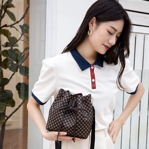 Retro brown printed bucket bag with drawstring closure for casual outdoor activities