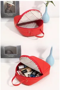 Detail of red quilted faux leather bag showing spacious storage for makeup and phone