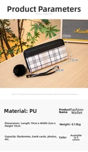 Close-up of long zip-around checkered wallet featuring a black pompom and wristlet strap