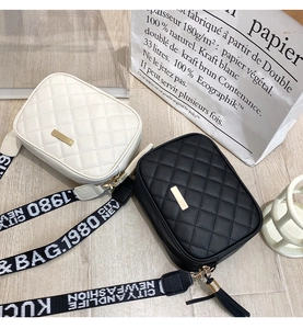 Quilted crossbody camera bags in black and cream with stylish patterned wide straps