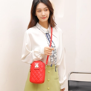 Chic red quilted crossbody cell phone bag with a sweet rabbit metal clasp and strap