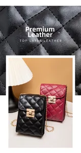 Macro detail of quilted top layer leather and metal turn-lock on the chain bag