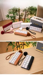 Classic plaid long wallets with faux leather trim and decorative fur ball charms