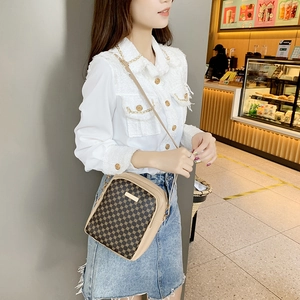 Chic beige crossbody bag with vintage dot pattern and gold metal detail for women