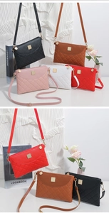 Detailed group view of crossbody bags with quilted pattern and gold metal hardware