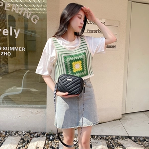Chic black quilted square bag with V-shaped texture and wide adjustable strap