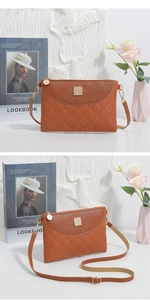 Close-up of brown quilted faux leather mini bag with gold square buckle and strap