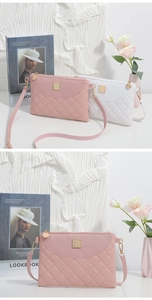 Detail of pink and white quilted mini bags with gold hardware and removable straps