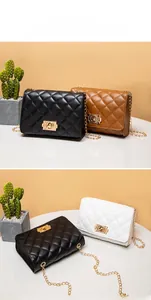 Detail of quilted rhombus patterns and gold chain straps on three luxury small bags