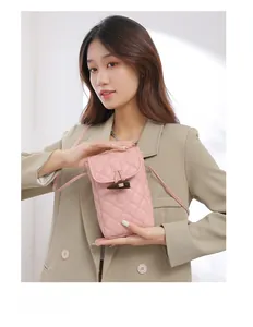 Pink quilted PU leather crossbody phone bag with horn buckle shown on an Asian model