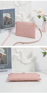 Detailed view of pink quilted PU leather crossbody bag with golden hardware and zipper