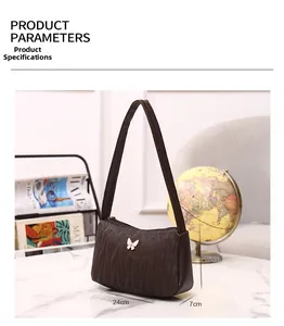 Detail of dark brown quilted shoulder bag with gold butterfly buckle and 24x15x7cm dimensions