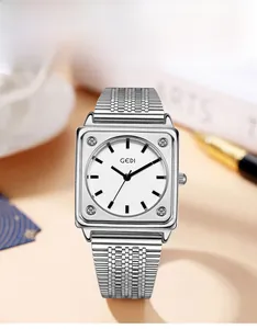 Detail of GEDI square silver steel watch with round dial and frosted finish texture