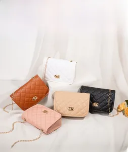 Detail of five quilted crossbody bags with chain straps and C-shaped metal turn-lock closures