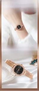 Close-up of Gedi women's watch with rose gold mesh strap and black sunray dial texture