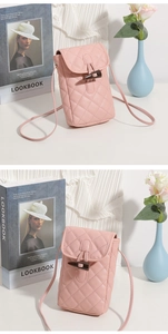 Detail of pink quilted mobile phone bag with toggle closure and PU leather texture