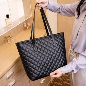 Large capacity black quilted leather tote bag for women with elegant long straps