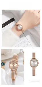 Detail of rose gold quartz watch with Milanese mesh strap and retro rectangular dial