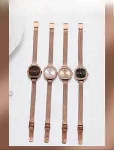 Detailed display of rose gold mesh strap quartz watches with four dial color options