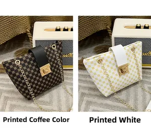 Detail showing brown and white chain bucket bags with circular patterns and gold locks