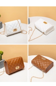 Close-up of quilted chain bags in white and brown with gold metallic twist locks