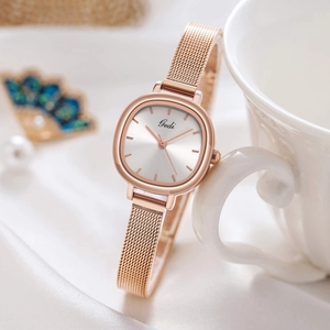 Elegant rose gold mesh strap quartz watch for women with rectangular dial on silk