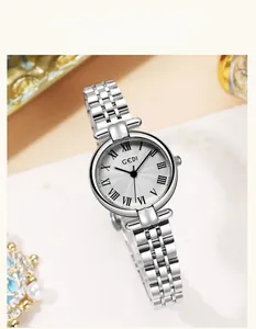 Detail of silver vintage ladies watch with Roman numerals and stainless steel link band