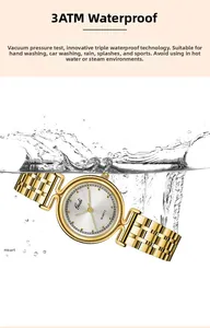 Close-up of golden quartz watch splashing in water showing 3ATM waterproof feature
