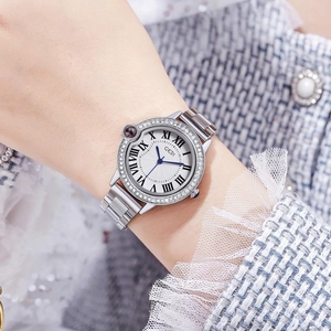 Luxury women's quartz watch with silver steel strap and diamond bezel on a round dial