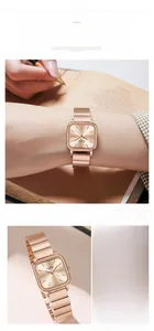 Détail d'une montre carrée en or rose avec bracelet métallique à maillons et cadran épuré