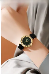 Macro shot of Gedi vintage quartz watch with green dial and black leather crocodile strap