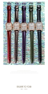 Detailed row of rectangular quartz watches with sparkling rhinestone dials and leather straps