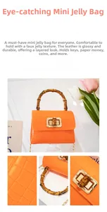Macro shot of orange crocodile pattern mini bag featuring vintage bamboo handle and gold lock