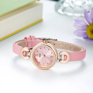 Montre à quartz élégante en or rose pour femme avec bracelet en cuir rose et strass