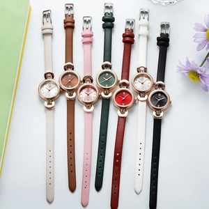 Montre à quartz élégante pour femme avec bracelet fin en cuir et boîtier rond en or rose brillant